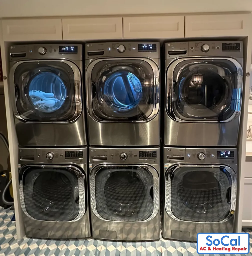 Stacked washers and dryers for repair in Woodland Hills.